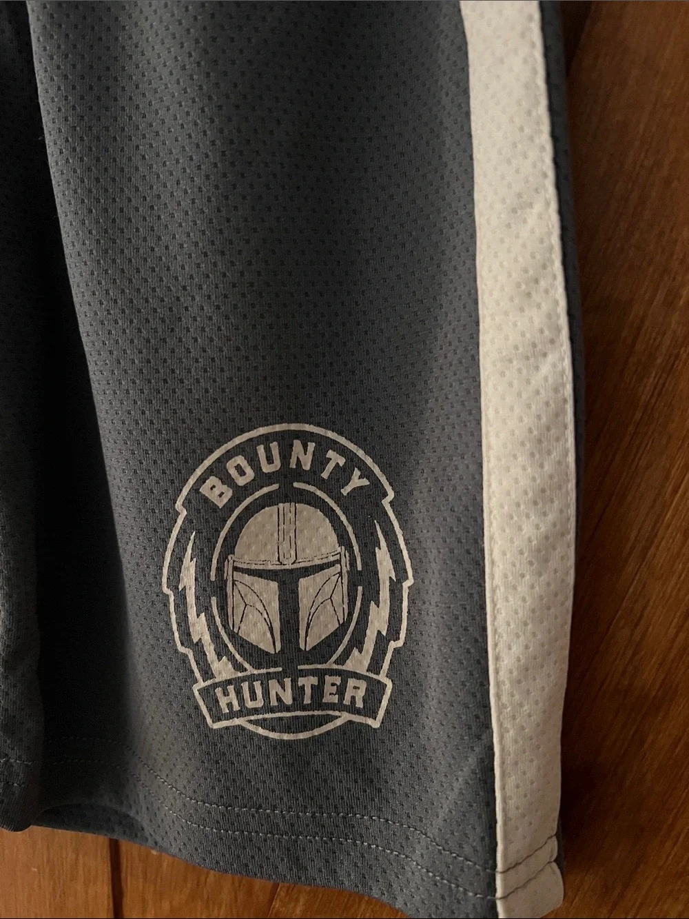 Boy’s Gray Athletic Shorts with Star Wars Bounty Hunter Emblem with side stripes